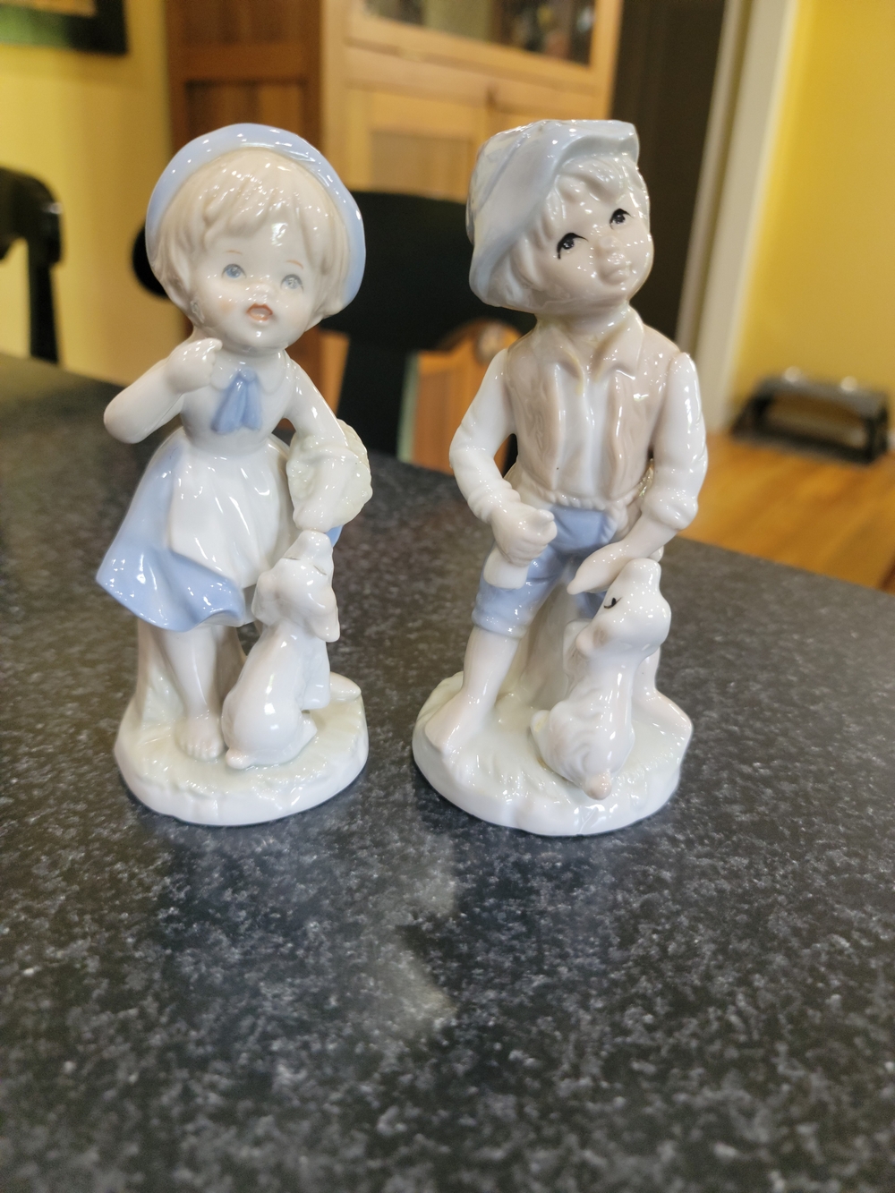 Porcelain Boy and Girl Figurine Pair in White and Light Blue